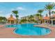 Relaxing resort-style pool with lounge chairs and nearby clubhouse at 4650 Links Village Dr # C303, Ponce Inlet, FL 32127