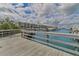 Wooden boardwalk offers scenic views of the marina and community at 4650 Links Village Dr # C303, Ponce Inlet, FL 32127