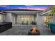 Spacious patio with hot tub, fire pit, and seating area at 53 Marden Dr, Ormond Beach, FL 32176