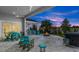 Outdoor kitchen, fire pit, hot tub, and patio furniture at 53 Marden Dr, Ormond Beach, FL 32176