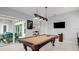 Game room with pool table and access to outdoor patio at 53 Marden Dr, Ormond Beach, FL 32176