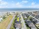 Aerial view showcasing a house with ocean views in a residential area at 53 Marden Dr, Ormond Beach, FL 32176