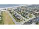 Aerial view of a coastal neighborhood with various houses and ocean views at 53 Marden Dr, Ormond Beach, FL 32176