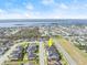 Aerial view showcasing a house near a waterway and other homes at 53 Marden Dr, Ormond Beach, FL 32176