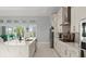 Spacious kitchen boasts a large island and bright, open layout at 53 Marden Dr, Ormond Beach, FL 32176