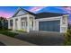 Two-story house with a large garage and porch at 53 Marden Dr, Ormond Beach, FL 32176