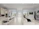 Open concept living area with a kitchen island and seating at 53 Marden Dr, Ormond Beach, FL 32176