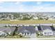 Aerial view of a house near the ocean in a quiet neighborhood at 53 Marden Dr, Ormond Beach, FL 32176