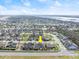 Aerial view of a neighborhood with a house near water and greenery at 53 Marden Dr, Ormond Beach, FL 32176