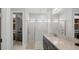 Bathroom with double vanity and walk-in shower at 53 Marden Dr, Ormond Beach, FL 32176