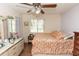 Bedroom with double bed, dresser, and ceiling fan at 1230 8Th Ave, Deland, FL 32724