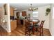 Kitchen with wood cabinets and a breakfast nook at 1230 8Th Ave, Deland, FL 32724
