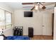 Simple bedroom with a double bed and ceiling fan at 1230 8Th Ave, Deland, FL 32724