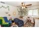 Bedroom with full-size bed and unique wall decor at 1230 8Th Ave, Deland, FL 32724