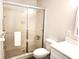 Clean bathroom with a shower stall and updated fixtures at 201 N Hill Ave # 150, Deland, FL 32724