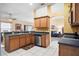 Kitchen with stainless steel appliances and wood cabinets at 2063 Killinger St, Deltona, FL 32738