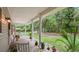 Front porch overlooking a large grassy yard at 5711 John Anderson Hwy, Flagler Beach, FL 32136