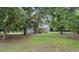 House with a spacious front yard and lush green grass at 5711 John Anderson Hwy, Flagler Beach, FL 32136