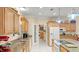 Kitchen with granite countertops, stainless steel appliances, and a walk-in pantry at 5711 John Anderson Hwy, Flagler Beach, FL 32136