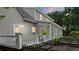 Screened porch and deck, backyard with plants at 5711 John Anderson Hwy, Flagler Beach, FL 32136