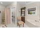 Bathroom with corner bathtub, shower, and toilet at 5711 John Anderson Hwy, Flagler Beach, FL 32136