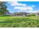 Large backyard with screened pool and plenty of green space at 6008 Sw 103Rd Loop, Ocala, FL 34476