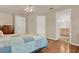 Main bedroom with access to en-suite bathroom and walk-in closet at 6008 Sw 103Rd Loop, Ocala, FL 34476