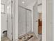 Bathroom with shower stall and linen closet at 6008 Sw 103Rd Loop, Ocala, FL 34476