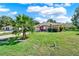 Single-story home with attractive landscaping and a welcoming front yard at 6008 Sw 103Rd Loop, Ocala, FL 34476
