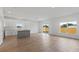 Modern kitchen with white cabinets and a grey island at 828 W 24Th St, Sanford, FL 32771