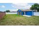 Spacious backyard with grassy area and privacy fence at 1171 Daimler Dr, Apopka, FL 32712