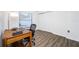 Bright home office with wood desk and hardwood floors at 1171 Daimler Dr, Apopka, FL 32712