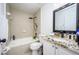 Updated bathroom with granite vanity, shower, and bathtub at 1171 Daimler Dr, Apopka, FL 32712