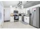 Modern kitchen with stainless steel appliances and granite countertops at 1171 Daimler Dr, Apopka, FL 32712