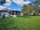 Large backyard with shed and screened porch at 1777 Oasis Ave, Deltona, FL 32725