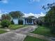 Single story home with driveway and landscaping at 1777 Oasis Ave, Deltona, FL 32725