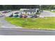 Aerial view of commercial property with ample parking space at 2490 N Woodland Blvd, Deland, FL 32720