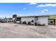 Commercial building with attached garage and parking at 2490 N Woodland Blvd, Deland, FL 32720