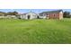 Spacious backyard with detached garage and shed at 2490 N Woodland Blvd, Deland, FL 32720