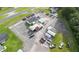 Aerial view of property showing multiple buildings and parking lot at 2490 N Woodland Blvd, Deland, FL 32720