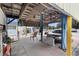 Covered carport area with a vehicle lift at 2490 N Woodland Blvd, Deland, FL 32720