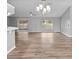 Spacious living area with hardwood floors and a chandelier at 2730 Woodland Dr, Edgewater, FL 32141