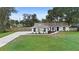 Newly renovated single-story home with a spacious lawn at 2730 Woodland Dr, Edgewater, FL 32141