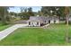 Newly renovated house with a large front yard at 2730 Woodland Dr, Edgewater, FL 32141