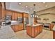 Spacious kitchen with stainless steel appliances and granite countertops at 3344 S Ridgewood Ave, Port Orange, FL 32129