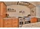 Gourmet kitchen features stainless steel appliances and brick accents at 3344 S Ridgewood Ave, Port Orange, FL 32129
