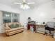 Home office with leather couch, desk, and ample workspace at 4 Oceans West Blvd # 108B, Daytona Beach, FL 32118