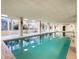 Indoor swimming pool with large windows at 4 Oceans West Blvd # 108B, Daytona Beach, FL 32118