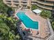Resort-style pool with plenty of lounge chairs at 4 Oceans West Blvd # 108B, Daytona Beach, FL 32118