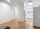 Bright living room with hardwood floors and view into kitchen at 4 Oceans West Blvd # 108B, Daytona Beach, FL 32118